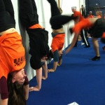 SANCAthon_2012_staff_handstandrelay_Maia_13sq